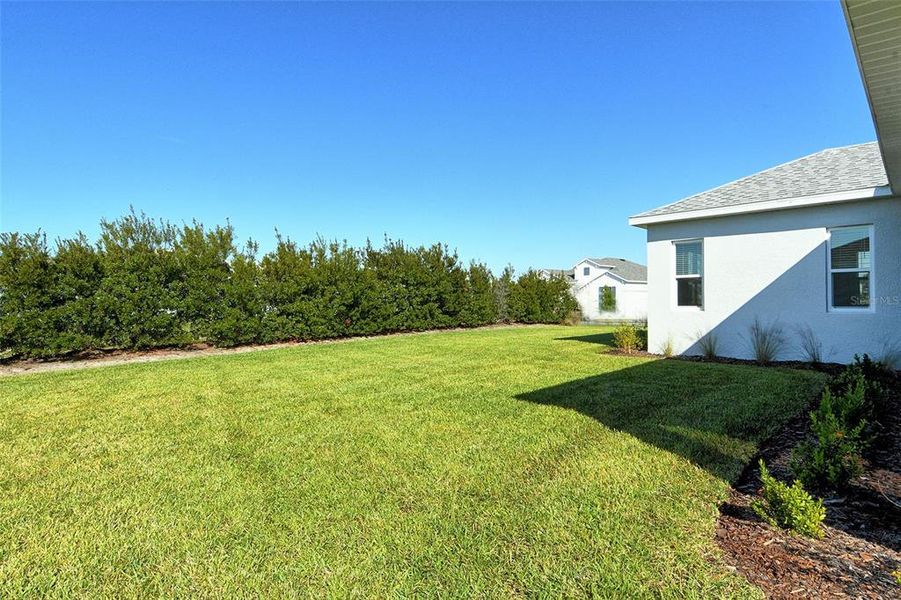 Exterior details and patio area of a home in Canoe Creek, Parrish (Image 4).