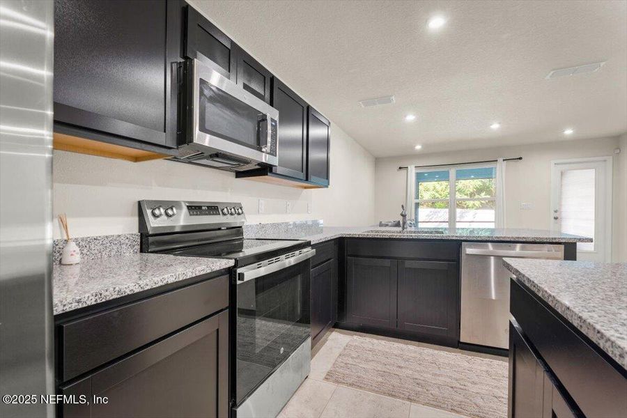 Furnished interior view inside a new home in , Jacksonville (Image 13). Furnished interior view inside a new home in , Jacksonville (Image 13).
