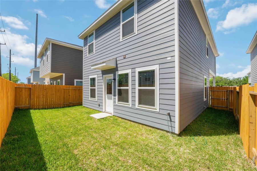 Exterior details and patio area of a home in , Houston (Image 4).