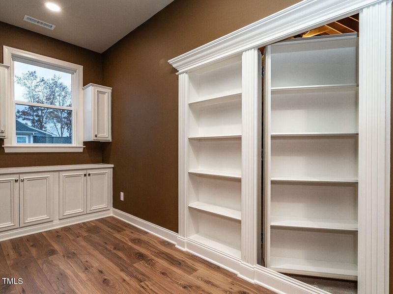 037-1280x960-hidden-storage-bookshelves