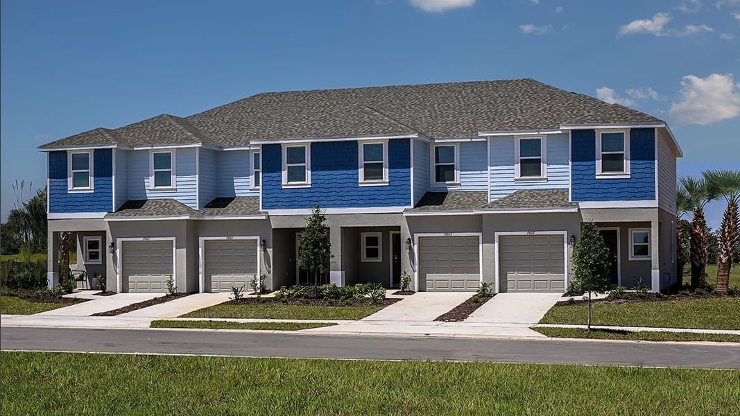 Front exterior of a new home in Waterstone Townhomes, Groveland, FL, highlighting curb appeal (Image 1). Front exterior of a new home in Waterstone Townhomes, Groveland, FL, highlighting curb appeal (Image 1).