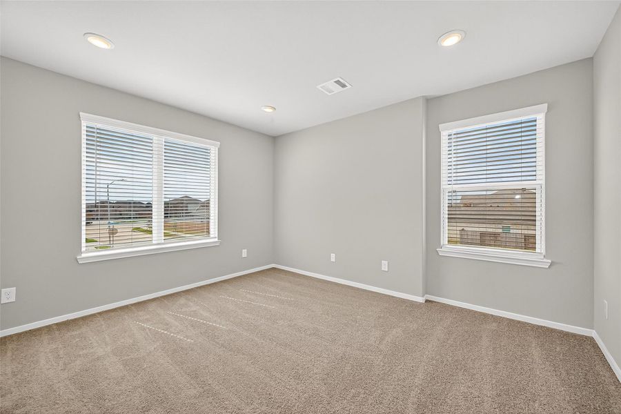 Spacious, unfurnished interior of a new home in Sunterra, Katy (Image 23).