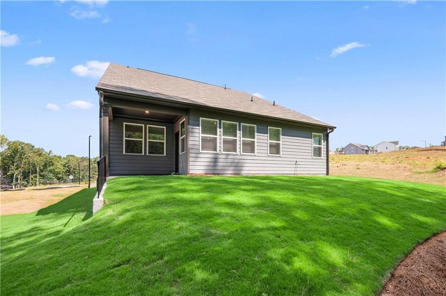 Front exterior of a new home in Cambridge at Steels Bridge: Steels Bridge, Canton, GA, highlighting curb appeal (Image 2). Front exterior of a new home in Cambridge at Steels Bridge: Steels Bridge, Canton, GA, highlighting curb appeal (Image 2).