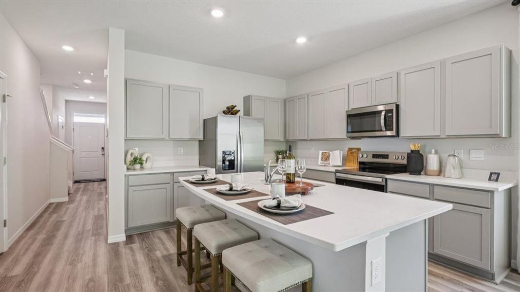 Furnished interior view inside a new home in Meadow Ridge at Epperson, Wesley Chapel (Image 8).