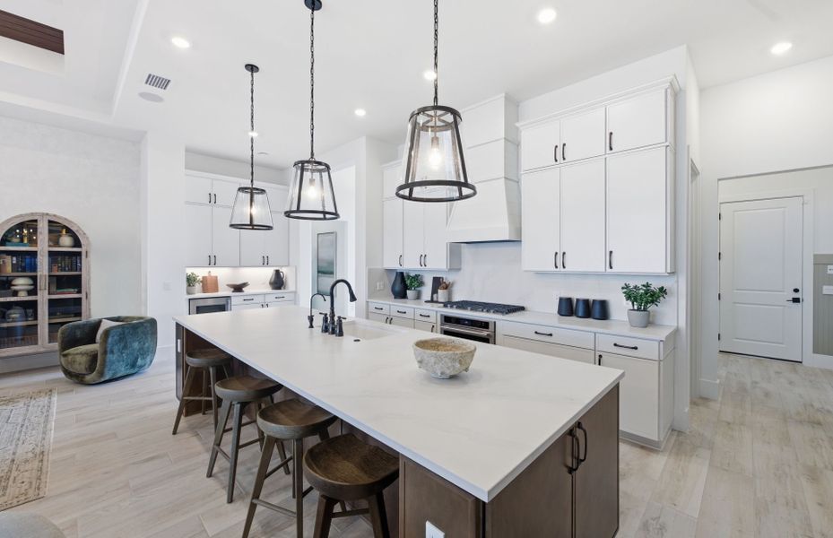 Representative furnished interior of a home built from the Aventura by DiVosta in Canter, Wellington (Image 8). Representative furnished interior of a home built from the Aventura by DiVosta in Canter, Wellington (Image 8).