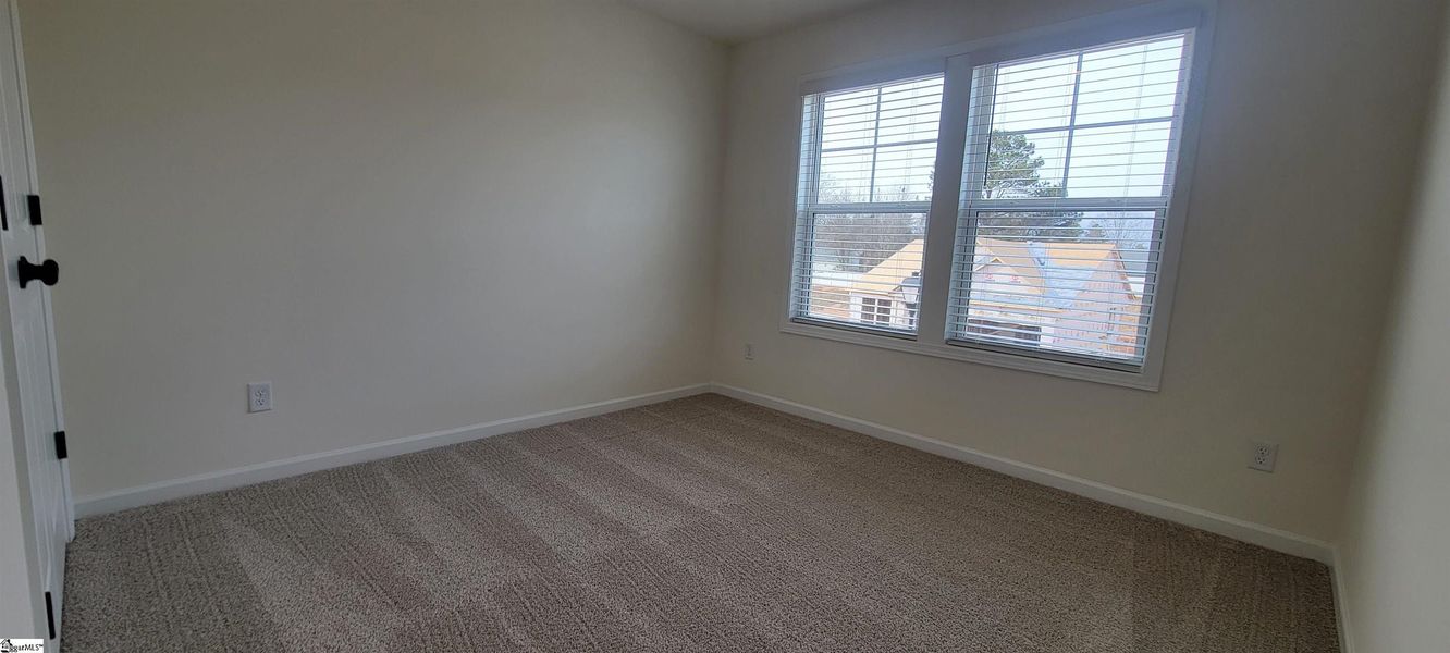 Spacious, unfurnished interior of a new home in Halton Oaks, Spartanburg (Image 27).