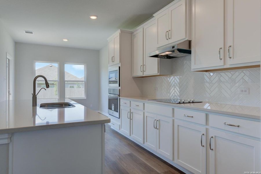 Furnished interior view inside a new home in Nopal Valley, San Antonio (Image 11).