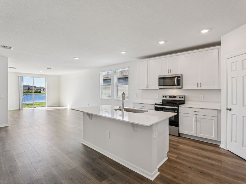 Furnished interior view inside a new home in Lake Deer Estates - Signature Series, Poinciana (Image 3).