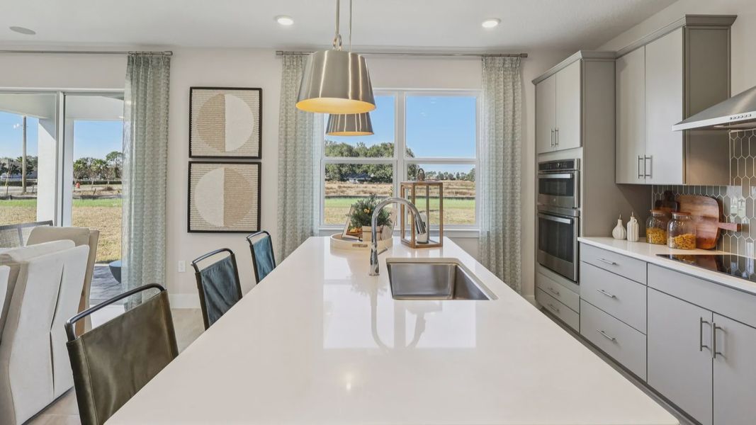 The Mangrove Kitchen at Lakeside at Satilla by DRB Homes in Saint Cloud, FL The Mangrove Kitchen at Lakeside at Satilla by DRB Homes in Saint Cloud, FL