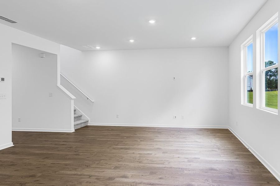 Representative unfurnished interior of a home built from the Avera by Taylor Morrison in Falls Creek, Flowery Branch (Image 14).
