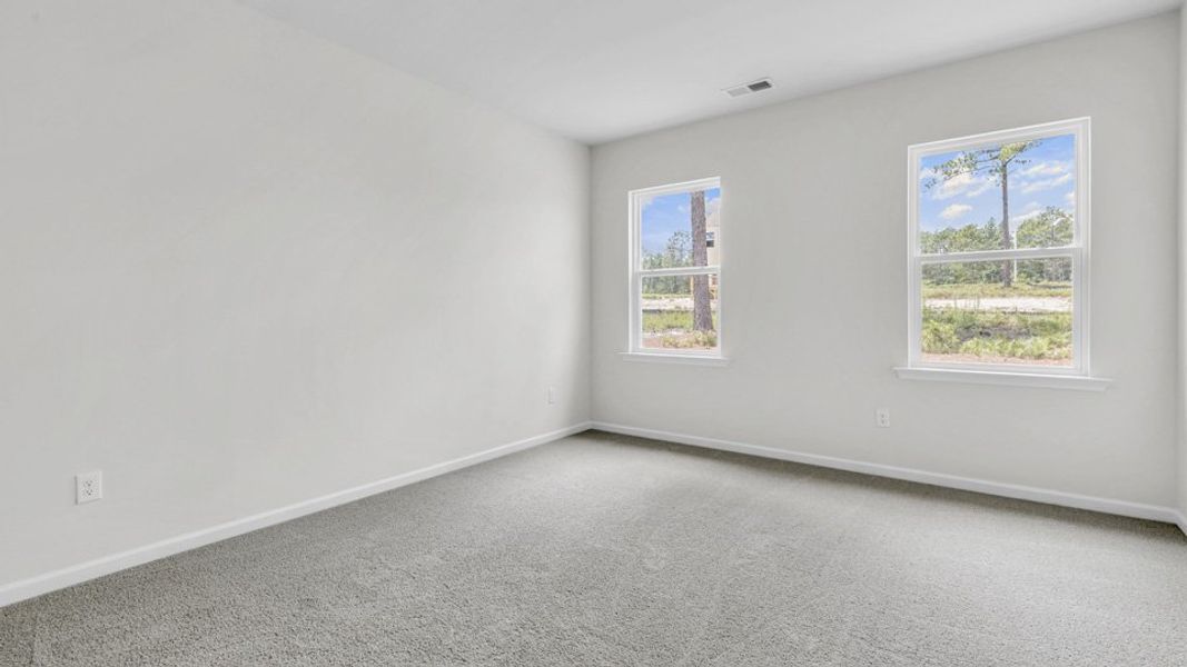 Spacious, unfurnished interior of a new home in Villa Grande, Winterville (Image 27).