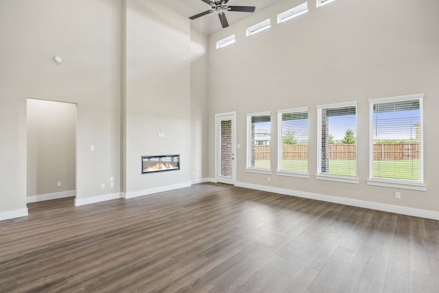 Representative unfurnished interior of a home built from the The Mockingbird by Lillian Custom Homes in Polo Ridge, Forney (Image 36).