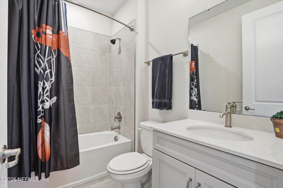 Furnished interior view inside a new home in RiverTown, St. Johns (Image 28).