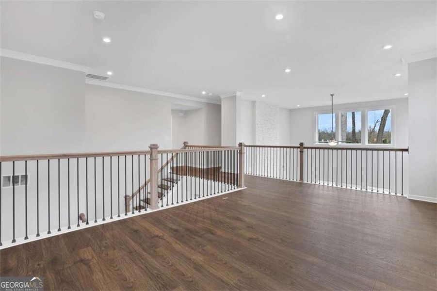 Spacious, unfurnished interior of a new home in The Paddocks at Doc Hughes, Buford (Image 47).