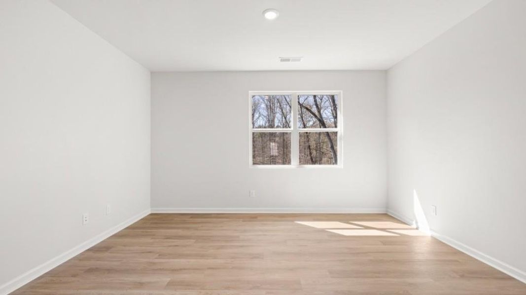 Spacious, unfurnished interior of a new home in South Wind, Fairburn (Image 29).