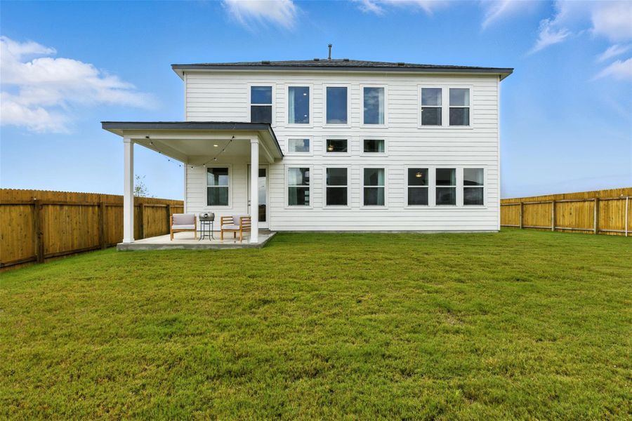 Exterior details and patio area of a home in Enclave at Cele, Pflugerville (Image 3).