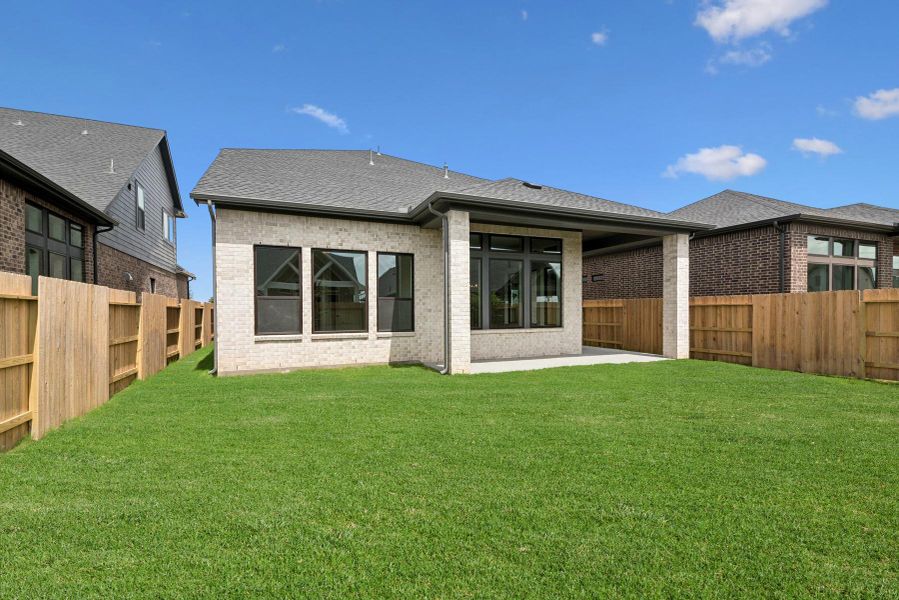 Front exterior of a new home in Grange 45' Homesites, Katy, TX, highlighting curb appeal (Image 27). Front exterior of a new home in Grange 45' Homesites, Katy, TX, highlighting curb appeal (Image 27).