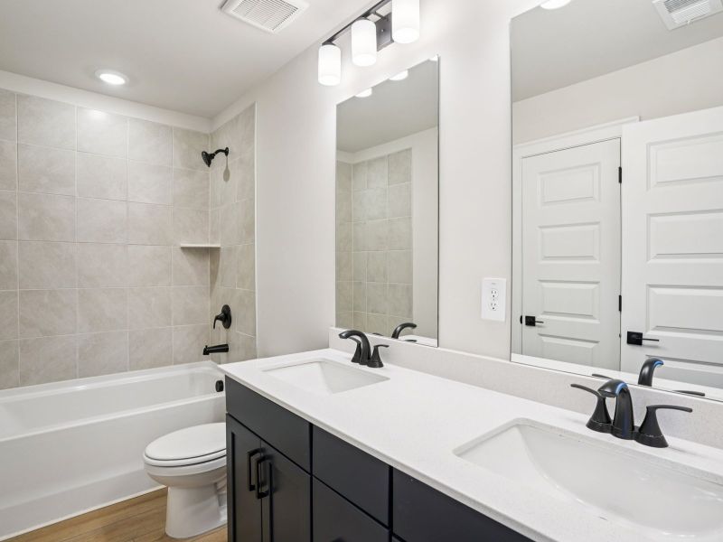 Furnished interior view inside a new home in Hemingway - Highland Series, Cumming (Image 9).