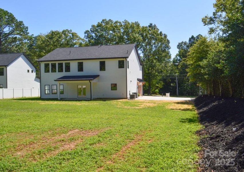 Front exterior of a new home in , Davidson, NC, highlighting curb appeal (Image 20).