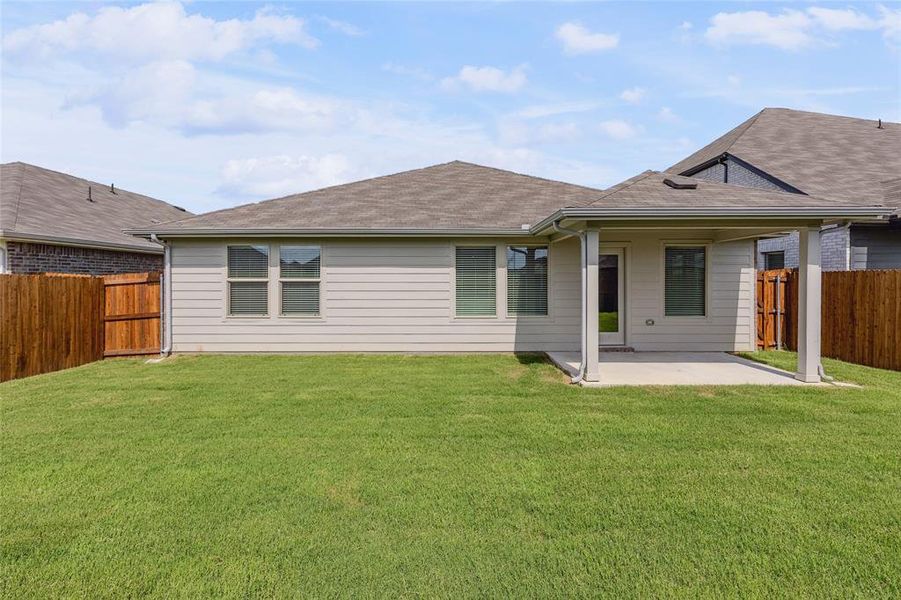 Front exterior of a new home in Stratton Place, Greenville, TX, highlighting curb appeal (Image 16).