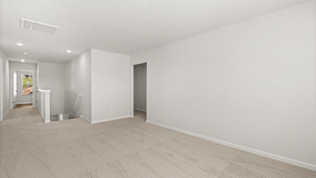 Representative unfurnished interior of a home built from the Halton by D.R. Horton in Southwind Village, Evans (Image 22).