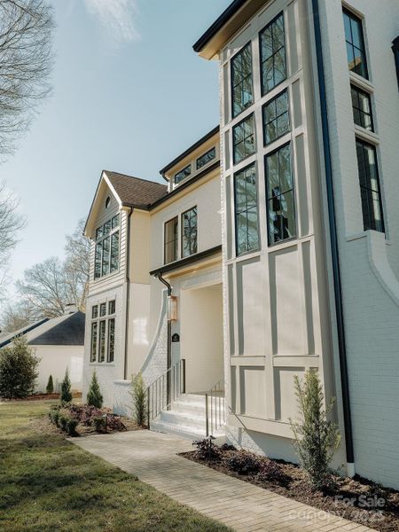 Front exterior of a new home in , Charlotte, NC, highlighting curb appeal (Image 26).