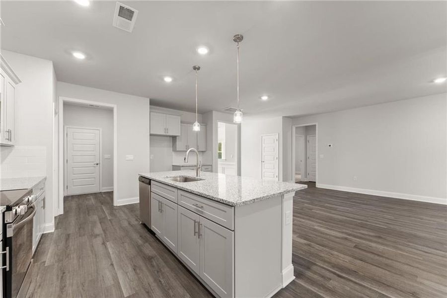 Furnished interior view inside a new home in Wood Creek Landing, Leland (Image 6).