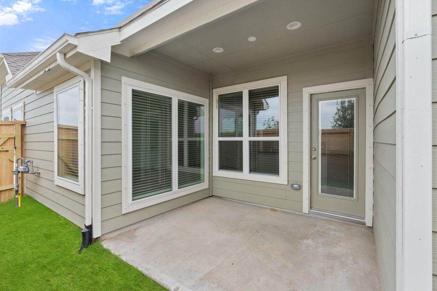 Exterior details and patio area of a home in Meridiana, Manvel (Image 12). Exterior details and patio area of a home in Meridiana, Manvel (Image 12).