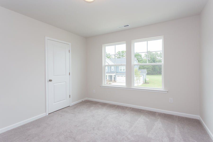 Representative unfurnished interior of a home built from the The Sycamore by Chesapeake Homes in Traditions at Carolina Forest, Myrtle Beach (Image 23).