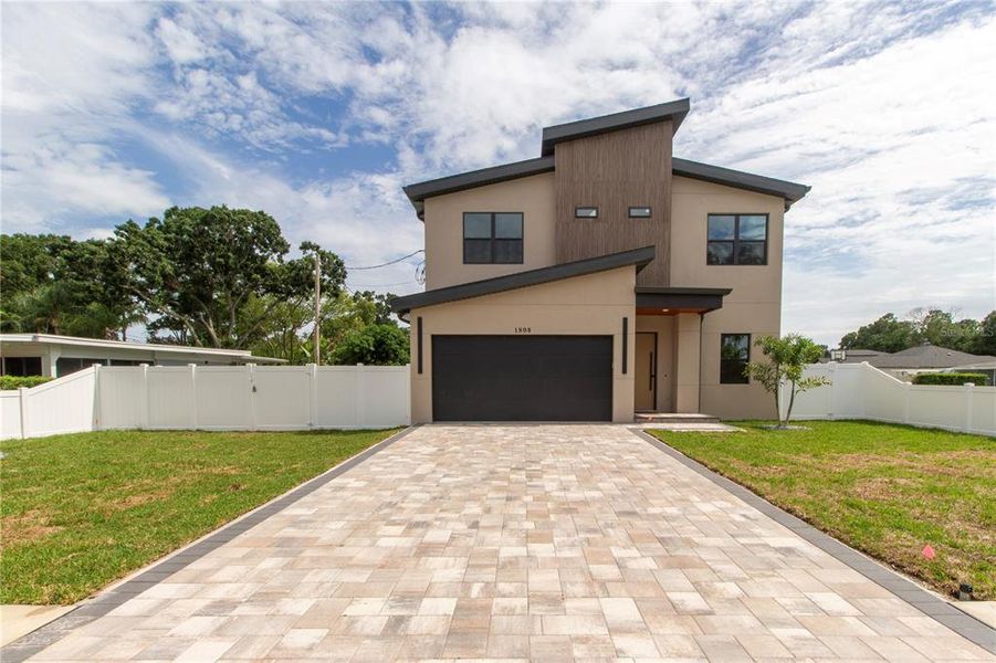 Front exterior of a new home in , Tampa, FL, highlighting curb appeal (Image 33).