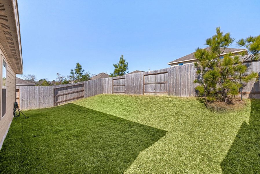 Exterior details and patio area of a home in Ladera Trails, Conroe (Image 24).