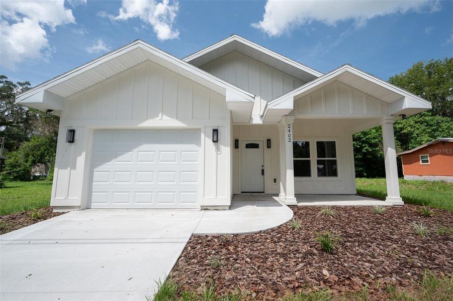 Front exterior of a new home in , Gainesville, FL, highlighting curb appeal (Image 16).