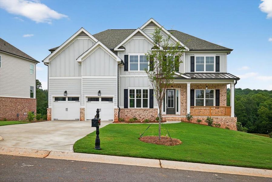 Front exterior of a new home in Traditions Of Braselton, Jefferson, GA, highlighting curb appeal (Image 27). Front exterior of a new home in Traditions Of Braselton, Jefferson, GA, highlighting curb appeal (Image 27).