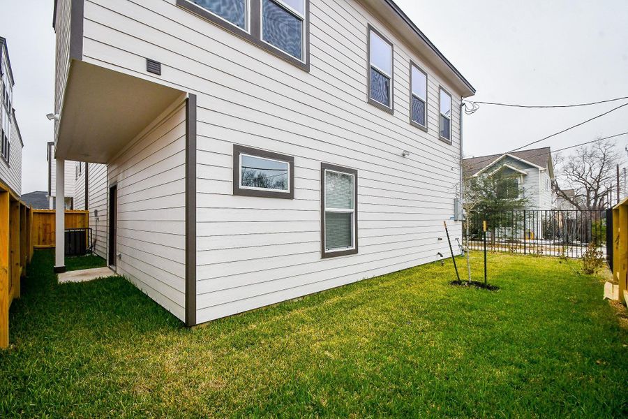 Front exterior of a new home in , Houston, TX, highlighting curb appeal (Image 21).