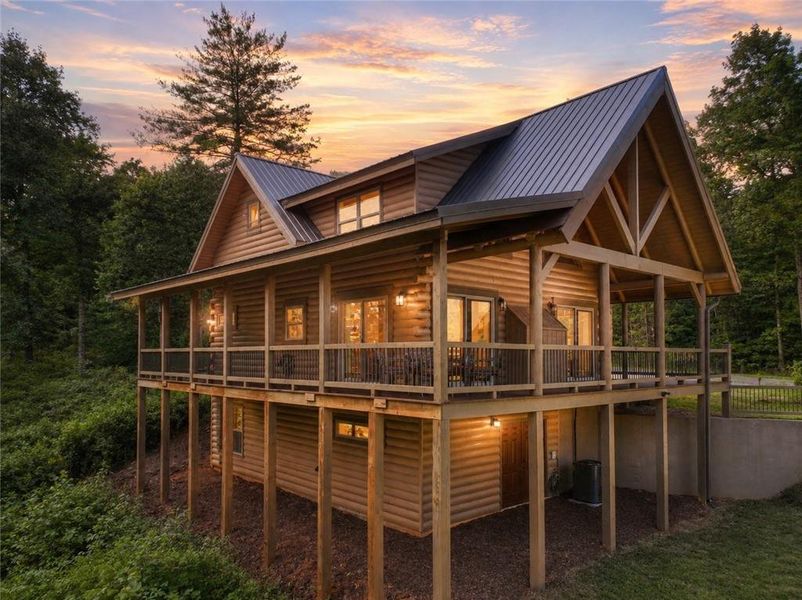 Exterior details and patio area of a home in , Ellijay (Image 29).