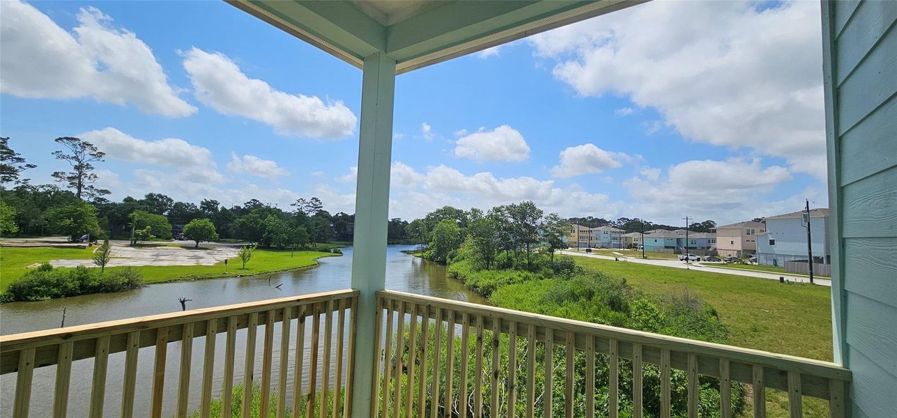 Exterior details and patio area of a home in Peacock Isle, Dickinson (Image 13).