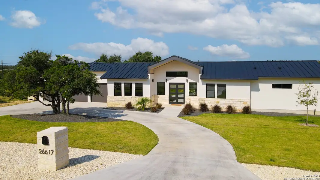 Front exterior of a new home in , San Antonio, TX, highlighting curb appeal (Image 1). Front exterior of a new home in , San Antonio, TX, highlighting curb appeal (Image 1).