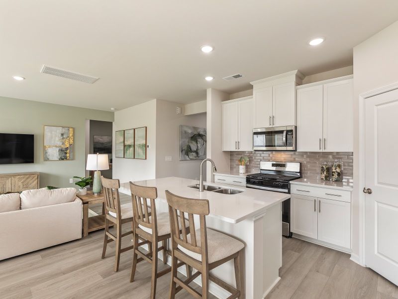 Kitchen in the Chatham floorplan at a Meritage Homes community in Angier, NC.