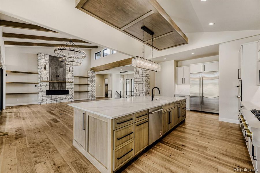 Kitchen opening to great room