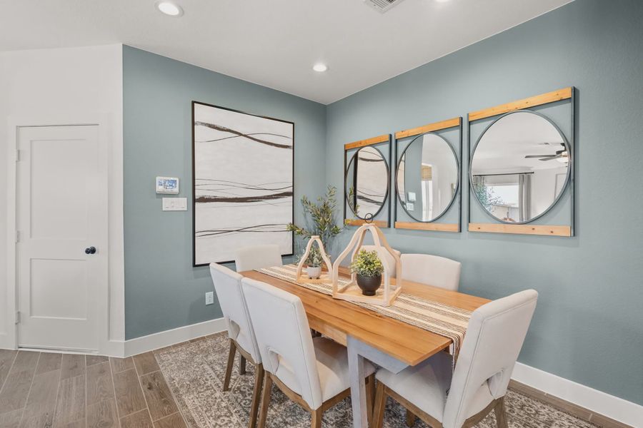 Representative furnished interior of a home built from the Countryside by Chesmar Homes in Meridiana Townhomes, Iowa Colony (Image 4).