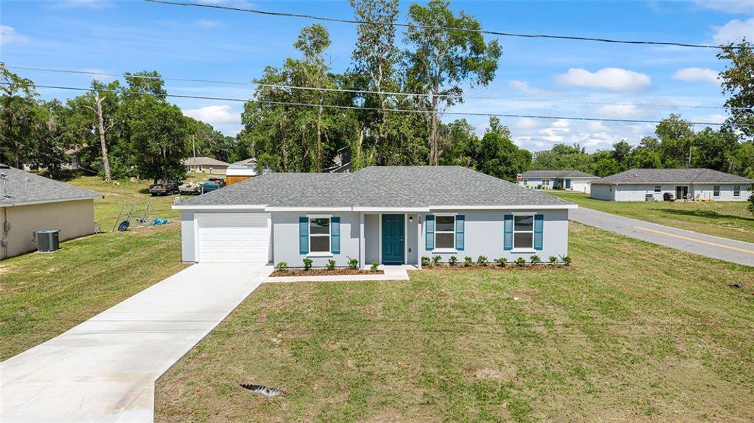 Front exterior of a new home in , Ocala, FL, highlighting curb appeal (Image 18).