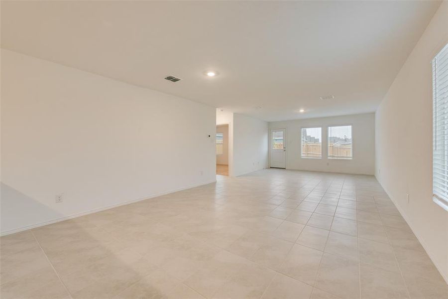 Spare room with light tile patterned floors