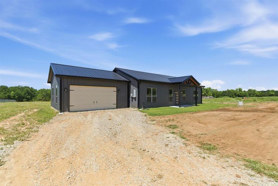 Exterior details and patio area of a home in , Whitt (Image 22).