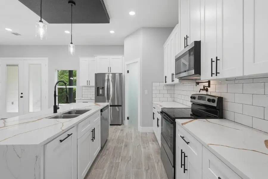 Furnished interior view inside a new home in , Willis (Image 13).
