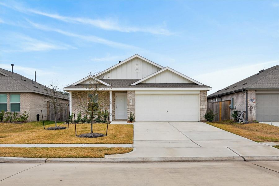 Front exterior of a new home in Anniston, Katy, TX, highlighting curb appeal (Image 19).