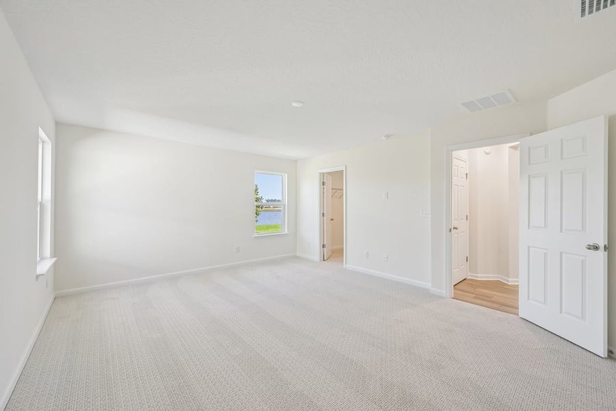 Spacious, unfurnished interior of a new home in Somerset - Executive Series, Palm Coast (Image 17). Spacious, unfurnished interior of a new home in Somerset - Executive Series, Palm Coast (Image 17).