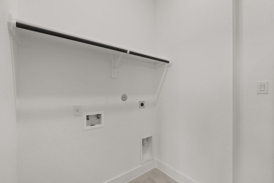 Representative unfurnished interior of a home built from the Pinehurst by Chesmar Homes in Riceland Alley Loads, Mont Belvieu (Image 20).