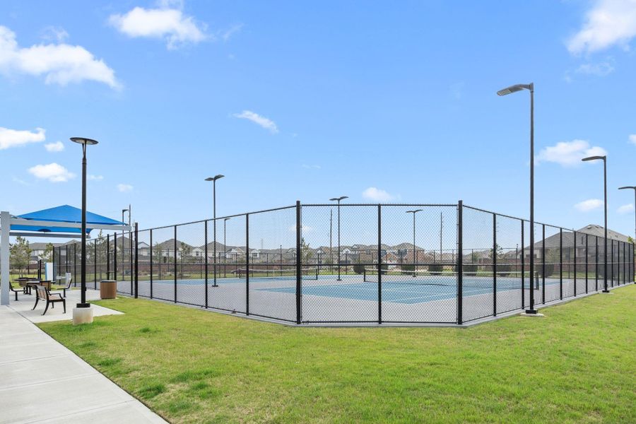 Lighted, fenced courts offer dedicated space for tennis and pickleball within Sunterra.