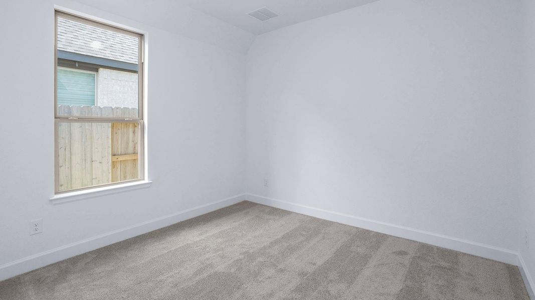 Spacious, unfurnished interior of a new home in The Groves 45', Humble (Image 9).