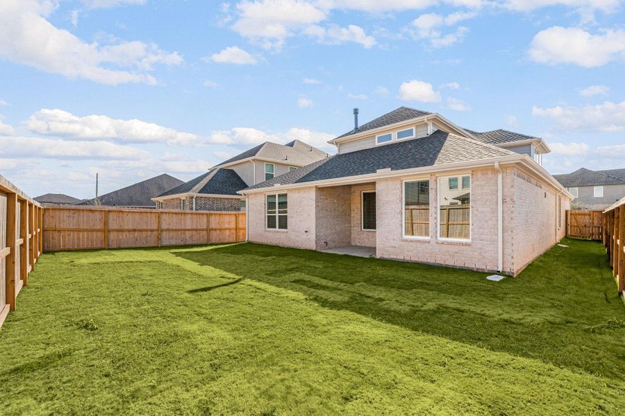 Exterior details and patio area of a home in Harvest Green, Richmond (Image 27). Exterior details and patio area of a home in Harvest Green, Richmond (Image 27).